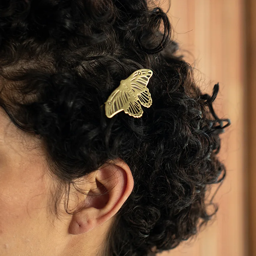Fermacapelli in ottone