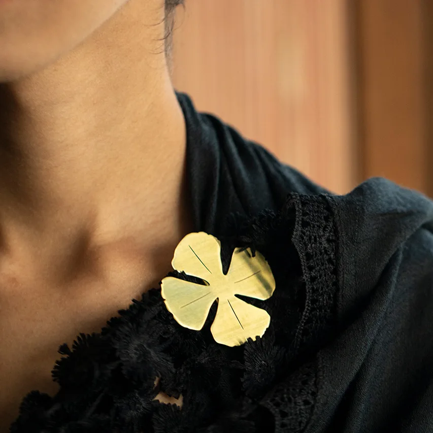 Fermacapelli in ottone